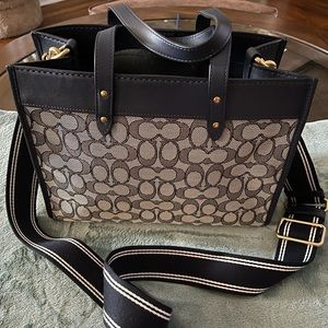 Blue crossbody Coach signature bag